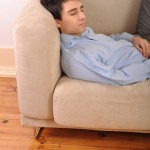 Man sleeping on couch